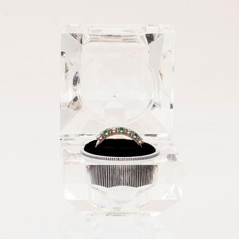 Ring half-eternity 18K white gold with round faceted emeralds and diamonds, Heribert Engelbert Stockholm 1981.