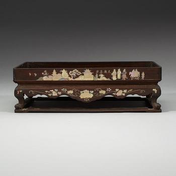 A wooden opium tray with inlays of mother-of-pearl, Qing dynasty, 19th Century.