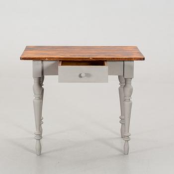 A TABLE WITH DRAW FROM CA 1900.