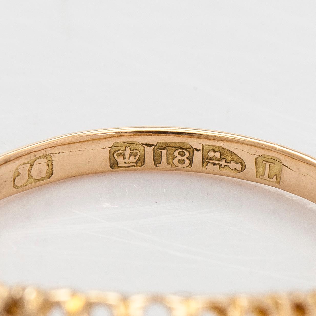 Ring, 18K guld och diamanter, England.