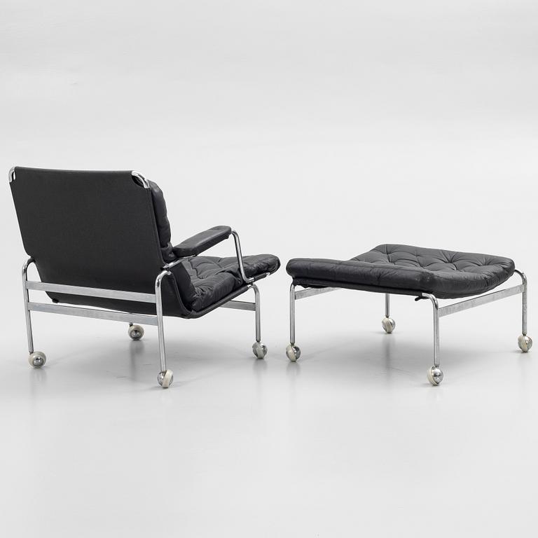 Bruno Mathsson, Armchair with footstool, "Karin 73", DUX, later part of the 20th century.