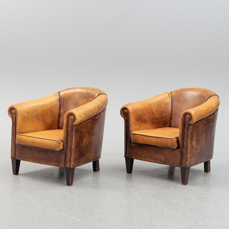 A pair of easy chairs, late 20th century.