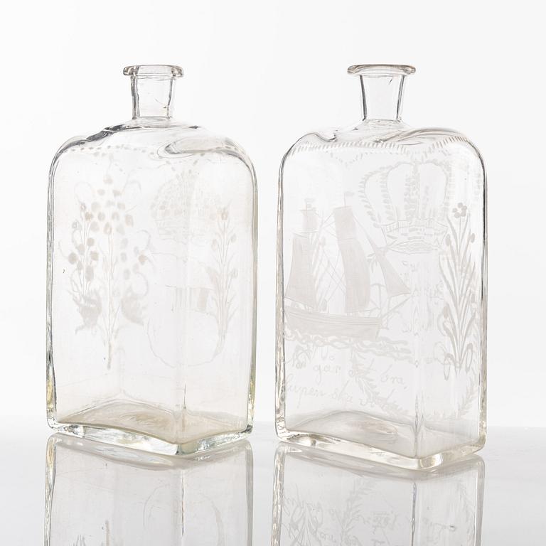 A set of seven glass bottles, 19th Century/circa 1900.