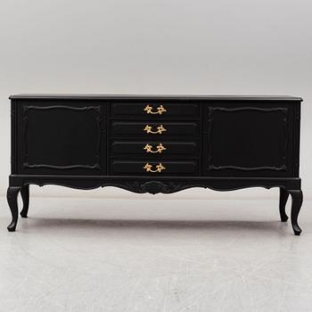 A second half of the 20th Century rococo style painted sideboard.