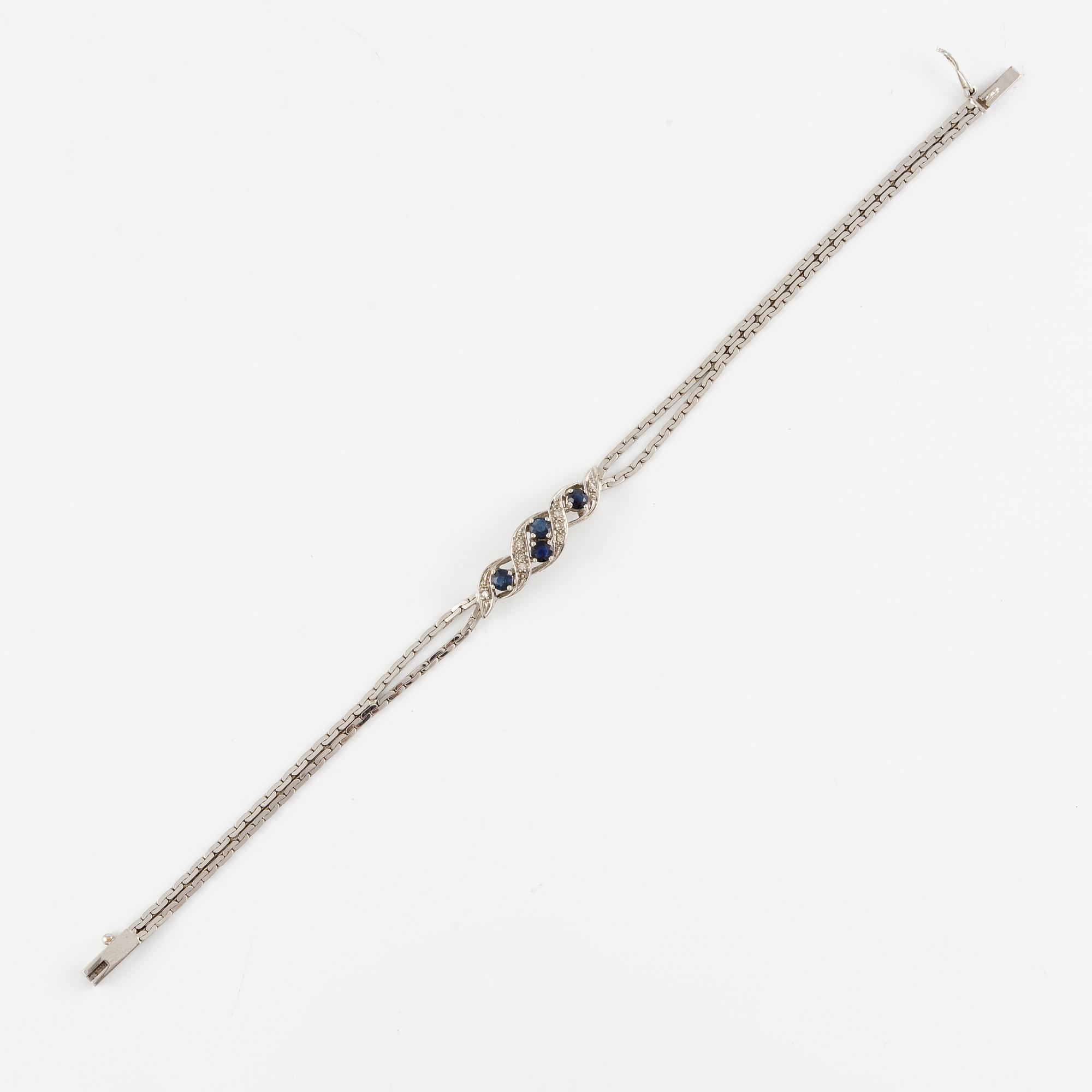 Arm bracelet, 18K white gold with small octagon-cut diamonds and sapphires.