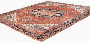 An antique Heriz carpet, ca 350 x 317 cm.