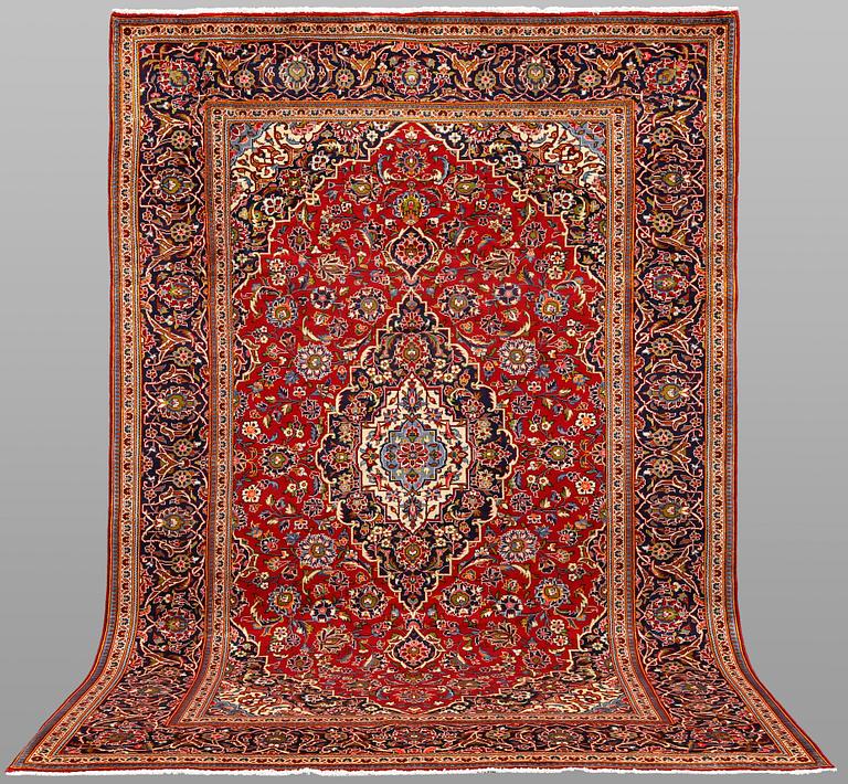 A Keshan carpet, 304 x 203 cm.