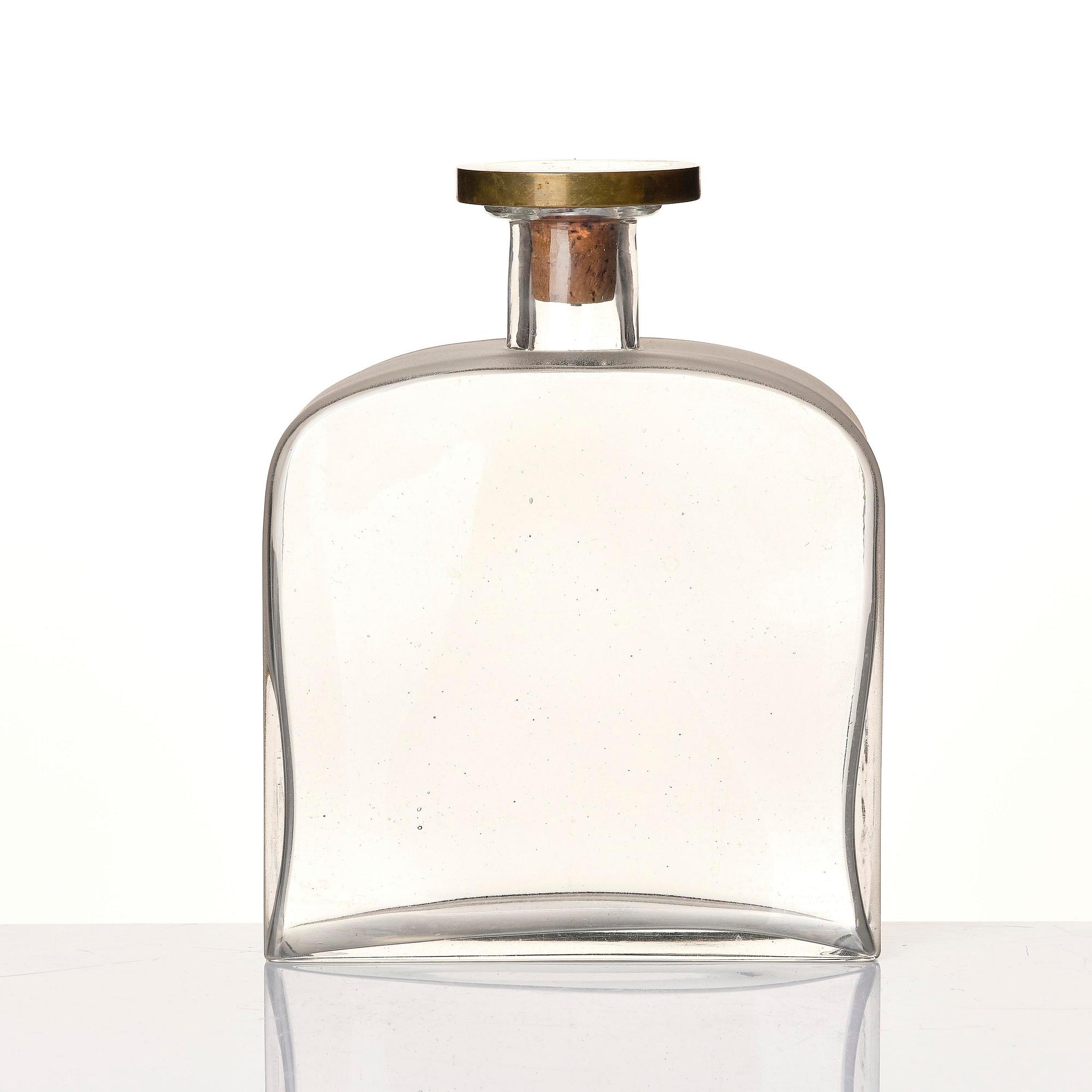 Firma Svenskt Tenn, a glass bottle model A 1608, with a pewter and brass stopper by Björn Trägårdh, Stockholm, 1930s.