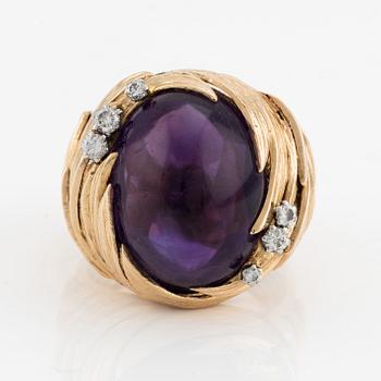 A ring in 18K gold with an amethyst designed by Barbro Littmarck, W.A. Bolin Stockholm 1971.