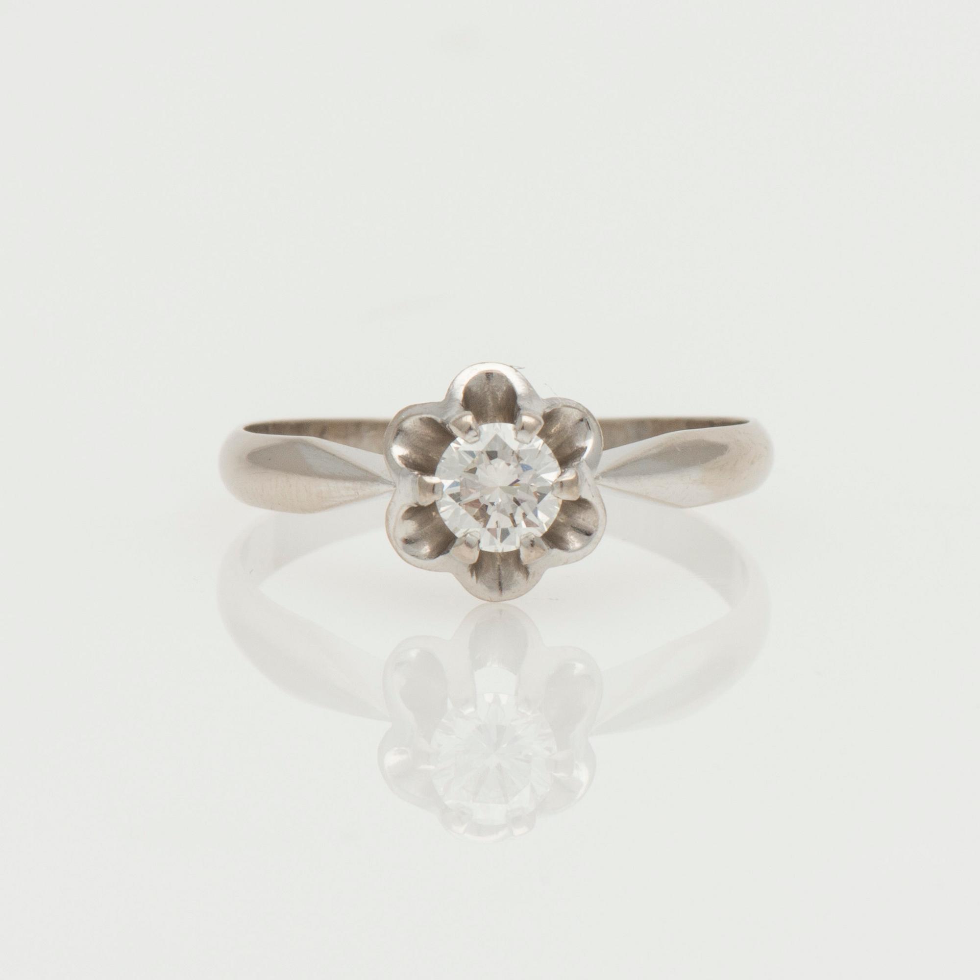 RING, briljantslipad diamant, 18K vitguld. Kultakeskus 1981.