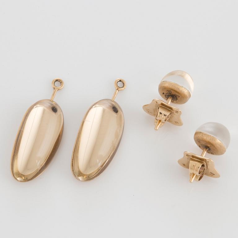 A pair of 18K gold H Stern earrings set with cabochon-cut rock crystal.