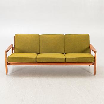 An Erik Wörtz 1962 walnut Kolding sofa for IKEA.