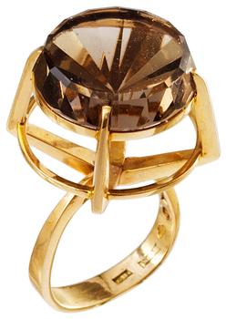 1160. A Claes Giertta 18 k gold and facet cut smokey quartz, Stockholm 1963.