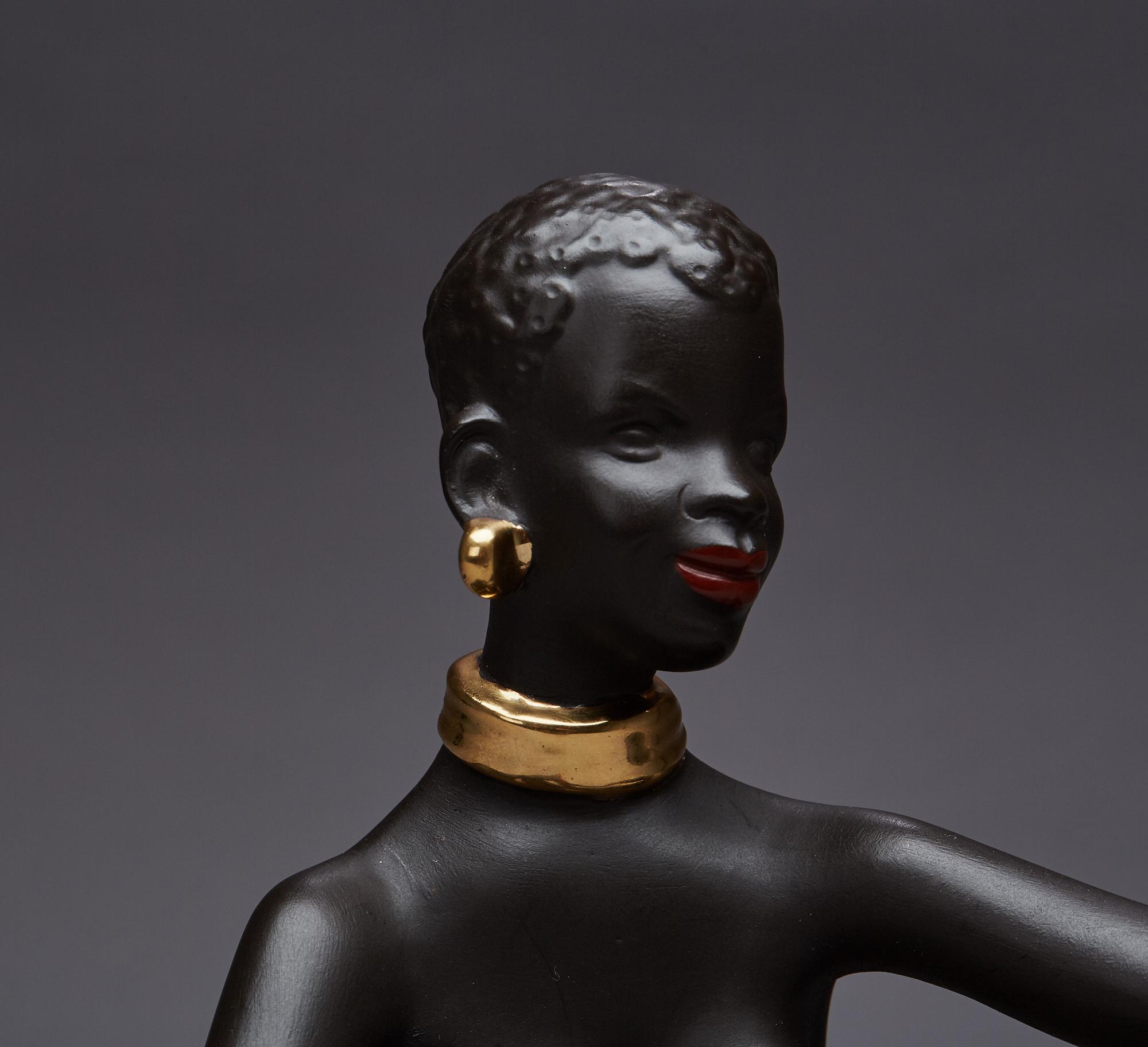 FIGURIN, etikettmärkt Goldscheider.