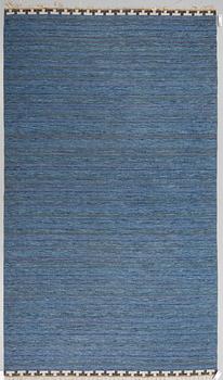 A CARPET, flat weave, atributed to Rakel Carlander, around 306 x 197 cm.