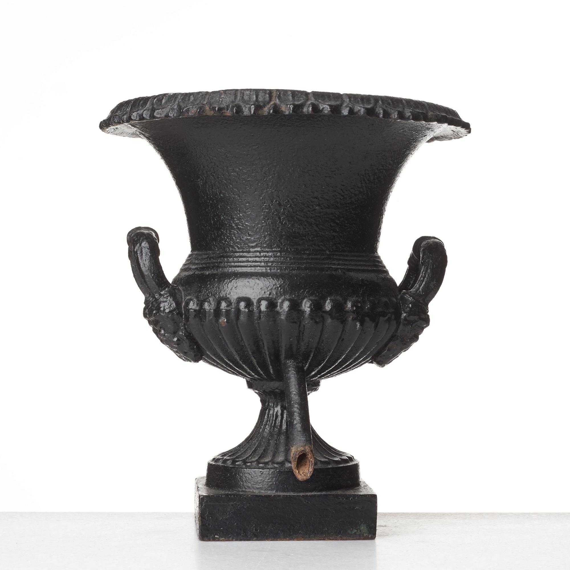 A Louis XVI-style garden urn, circa 1900.