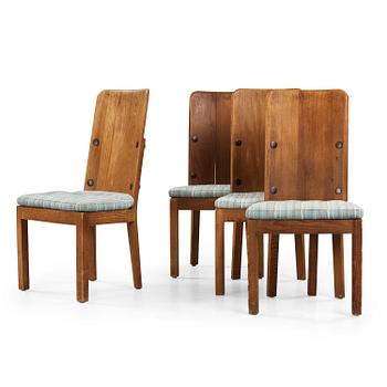 A set of four Axel Einar Hjorth stained pine 'Lovö' chairs, Nordiska Kompaniet, Sweden 1930's.