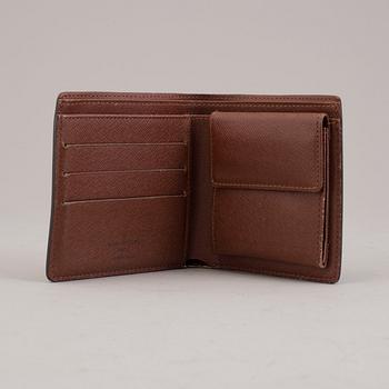 LOUIS VUITTON, a monogram canvas wallet.