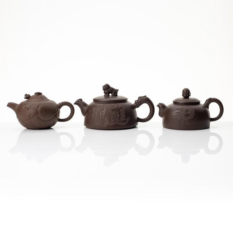 A group of three Chinese yixing teapots, 1980s.