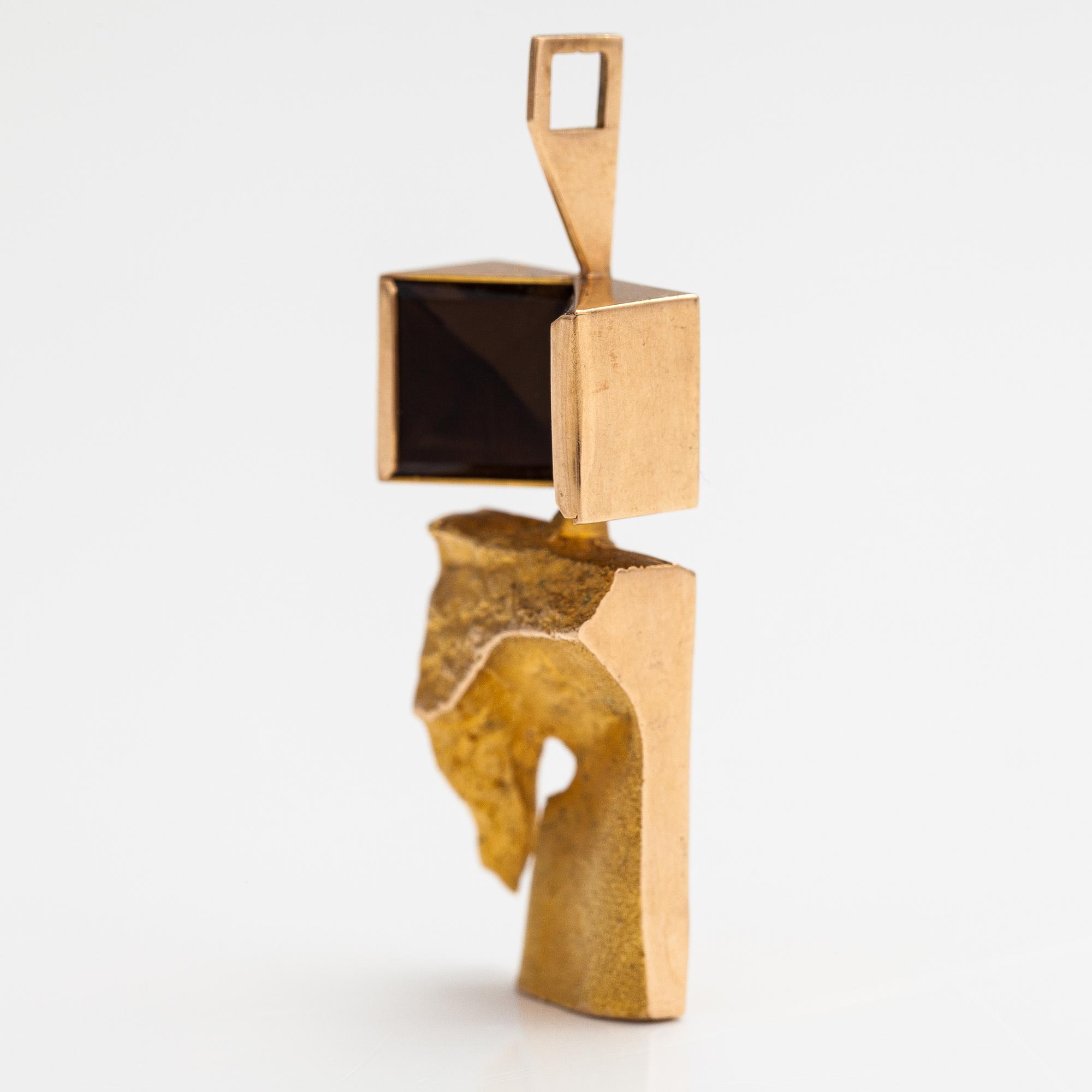 Björn Weckström, A 14K gold pendant "Narcissos" with a smoaky quartz and a rock crystal. Lapponia 1965.