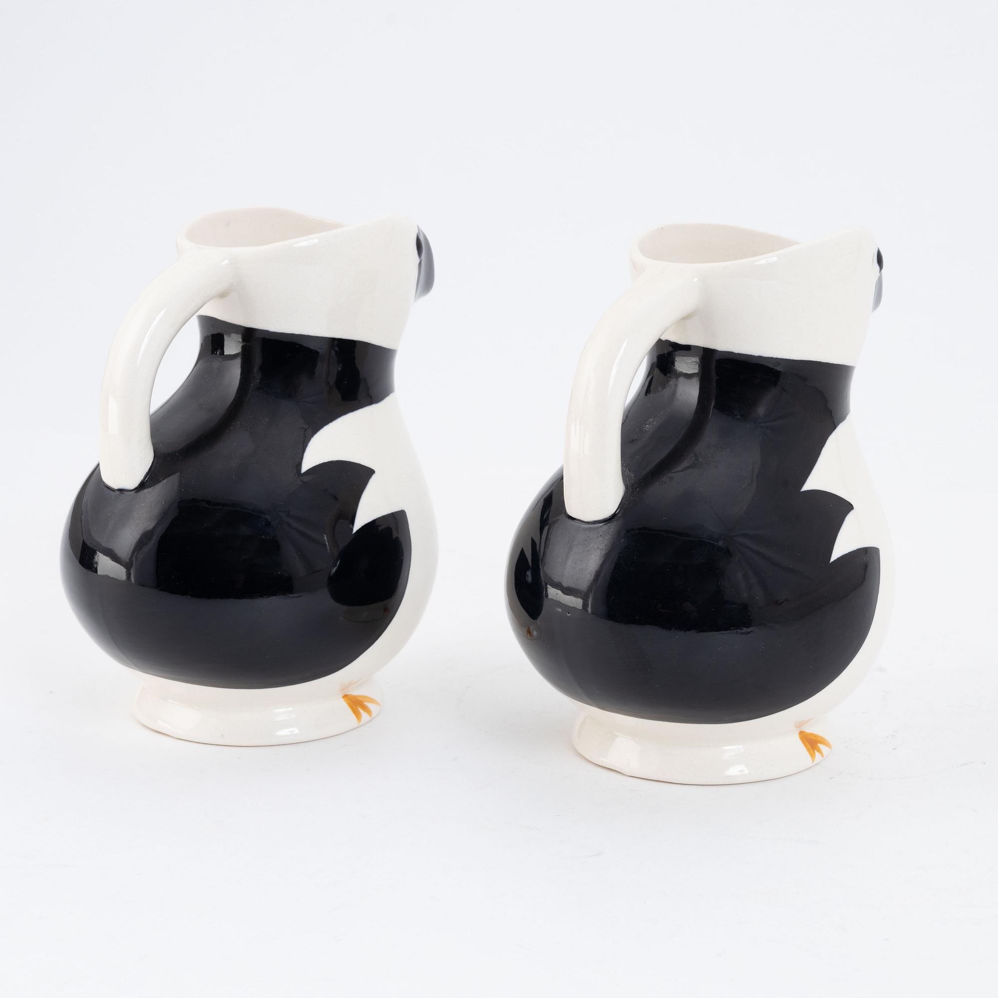 A pair of creamware ewers, "Alkemugge", Egersunds Fayancefabrik, Norway, designed 1910, produced around 1930.