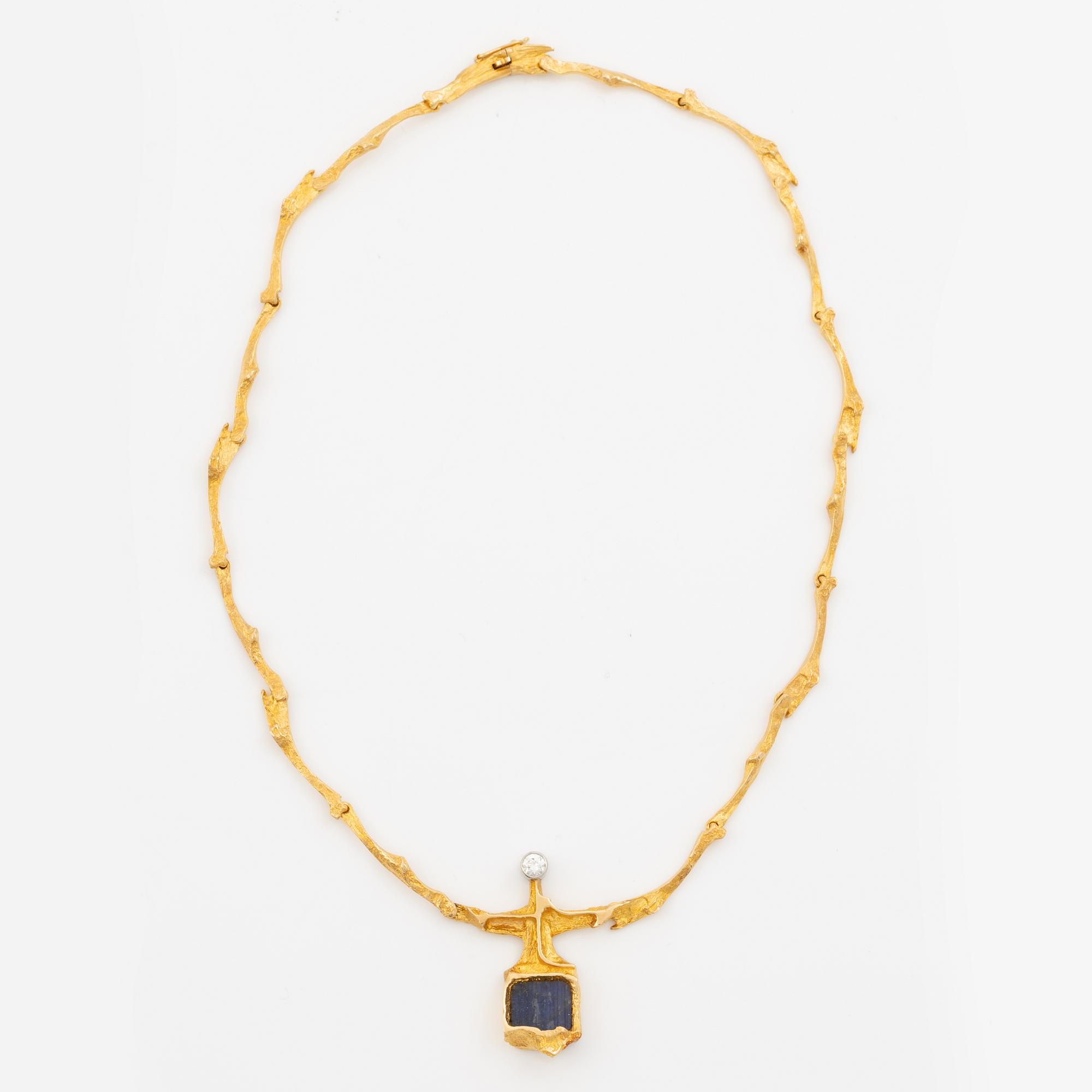 Lapponia necklace 18K gold with spectrolite and brilliant-cut diamond, 1976.