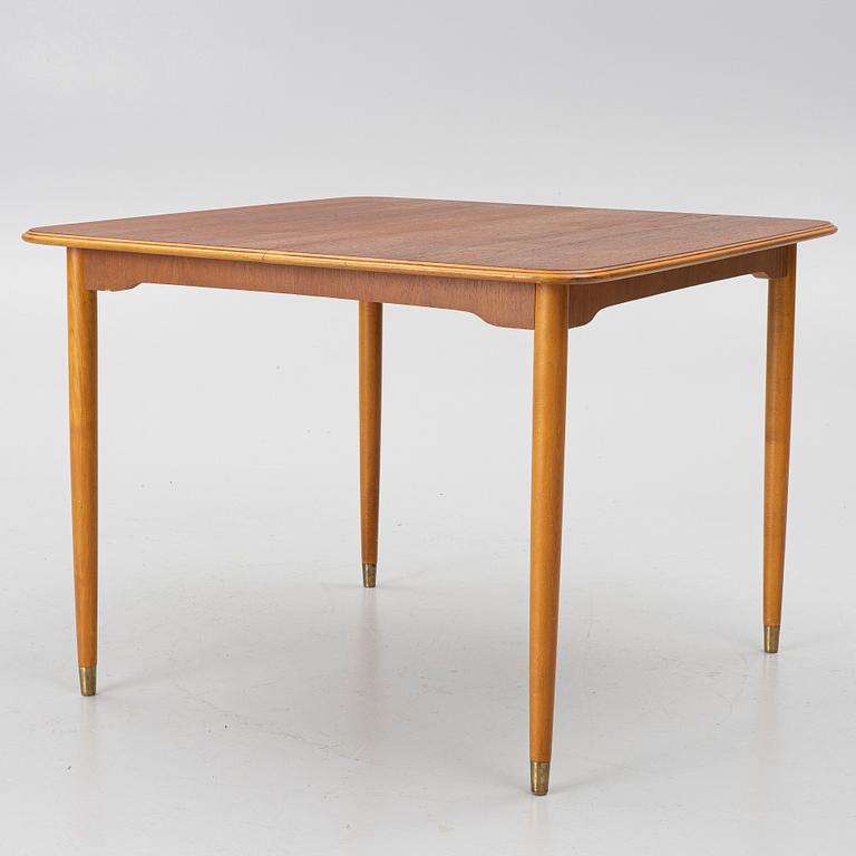 A dining table, teak, 1960s.