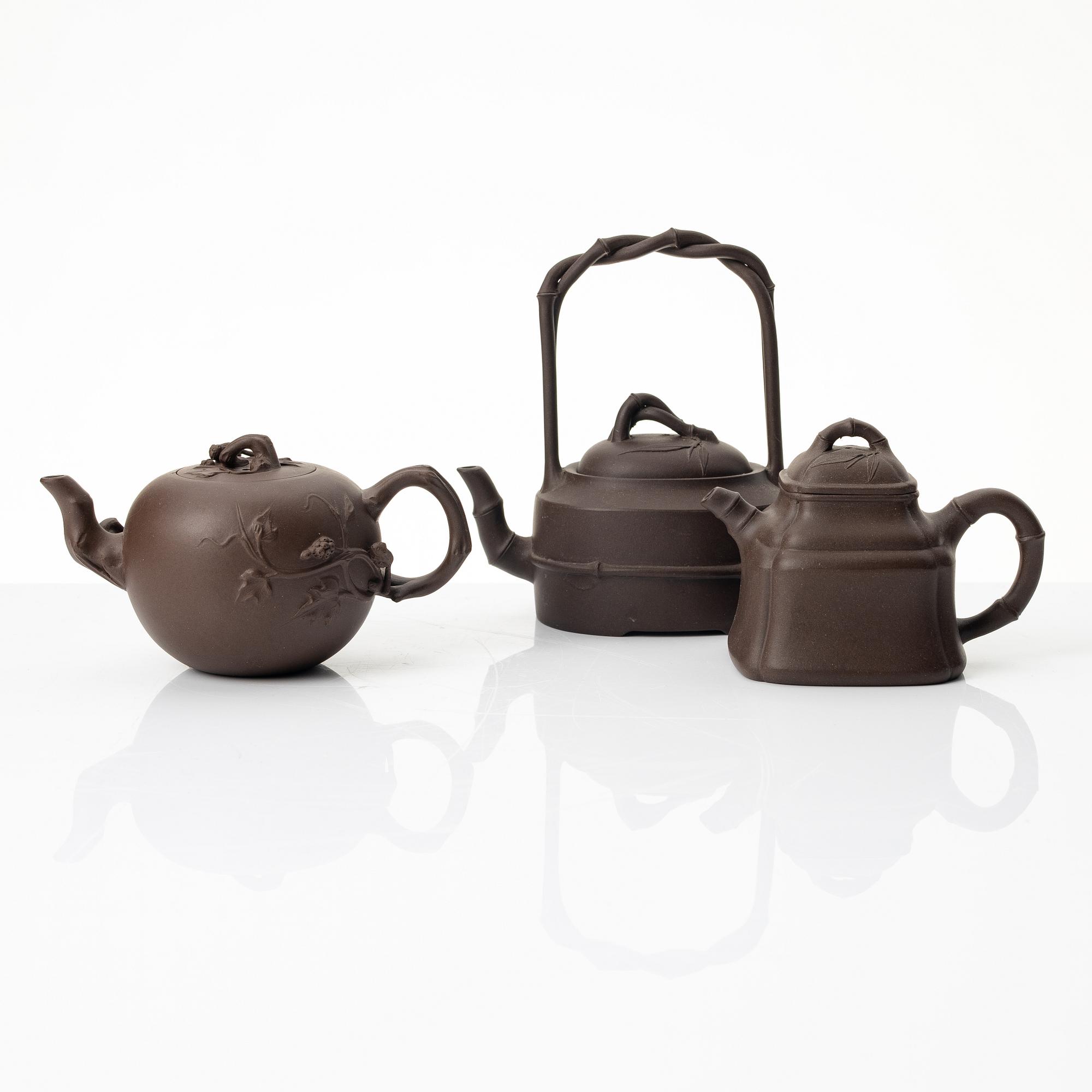 A group of three Chinese yixing teapots, 1980s.