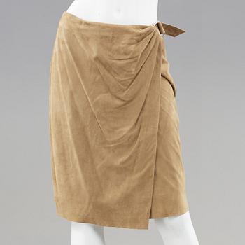 A beige suede skirt by ralph Lauren.