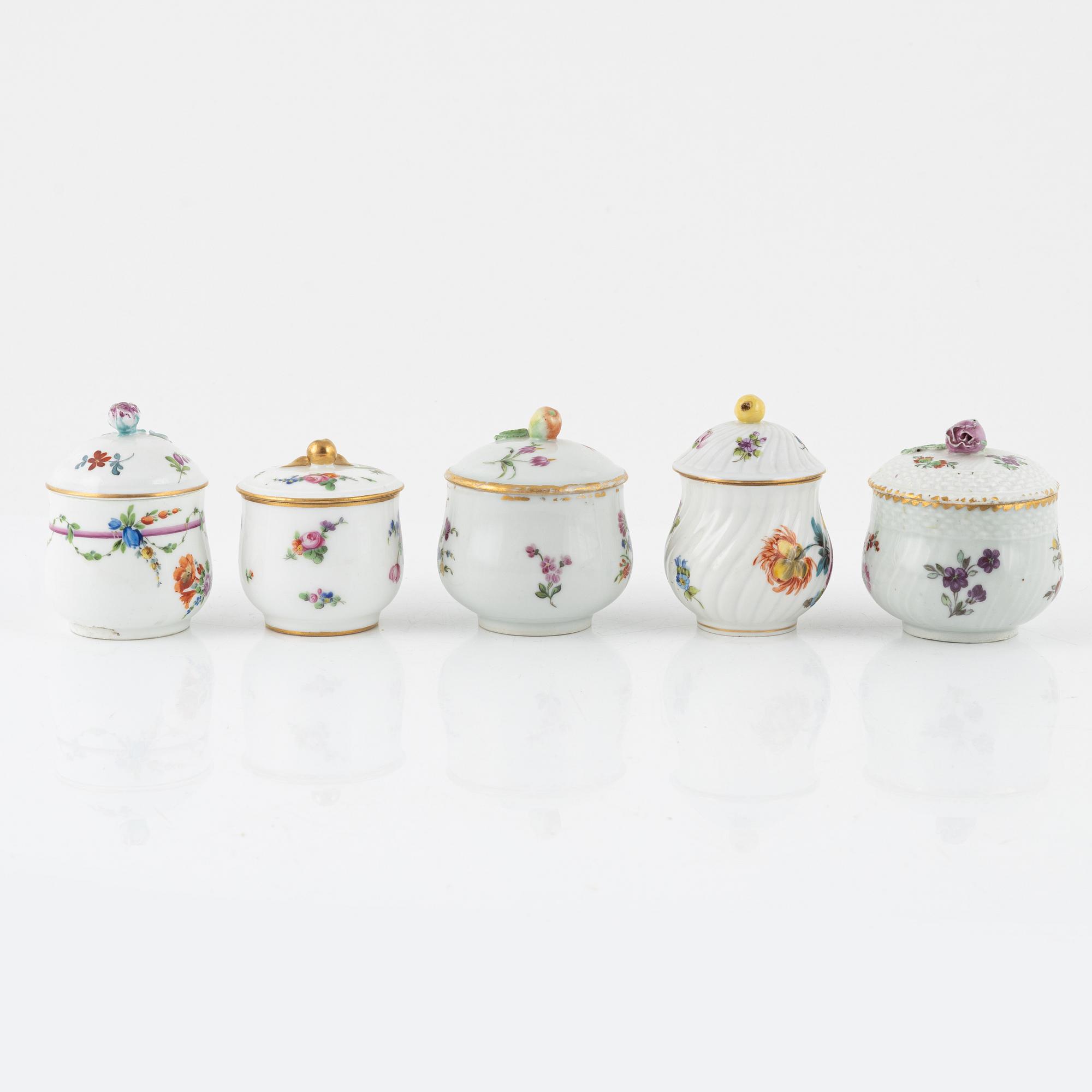 Two dinner plates and 11 custard cups with covers, 18th/20th Century.