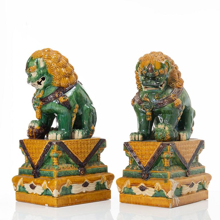 A pair of large figures of buddhist lions, China, second half of the 20th Century.