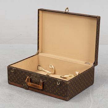 Louis Vuitton, a monogram canvas 'Bracken' suitcase, mid 20th Century.