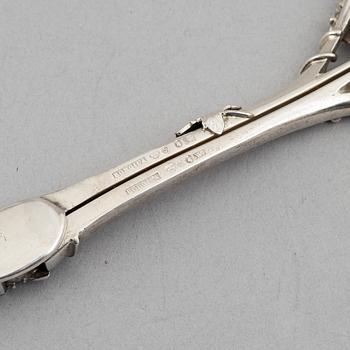 Three silver tongs, Sweden and Denmark, 1834-1923.