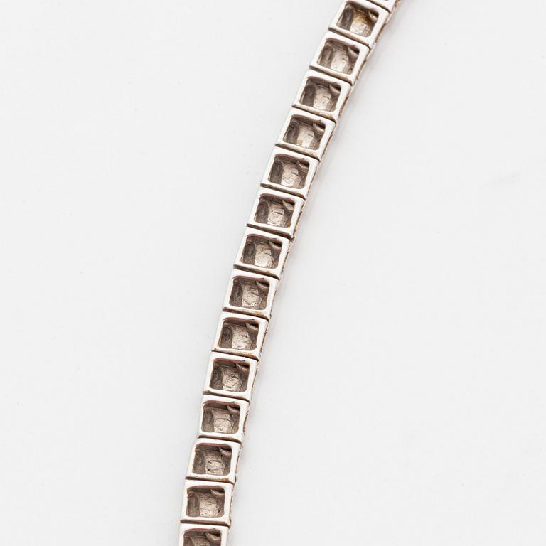 Collier rivière 18K vitguld runda briljantslipade diamanter.