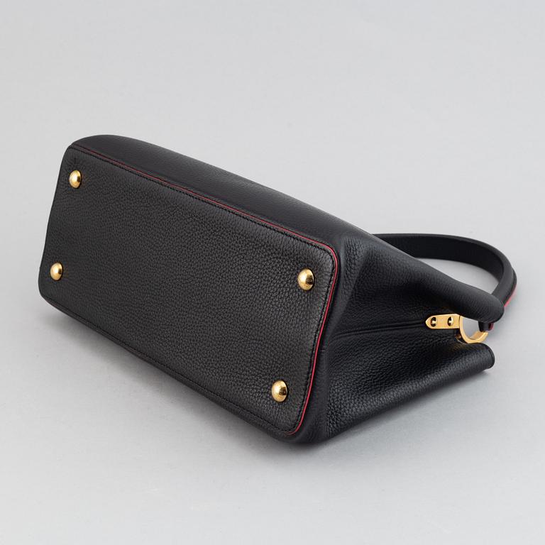 Louis Vuitton, a 'Capucines MM' Taurillon leather, 2015.