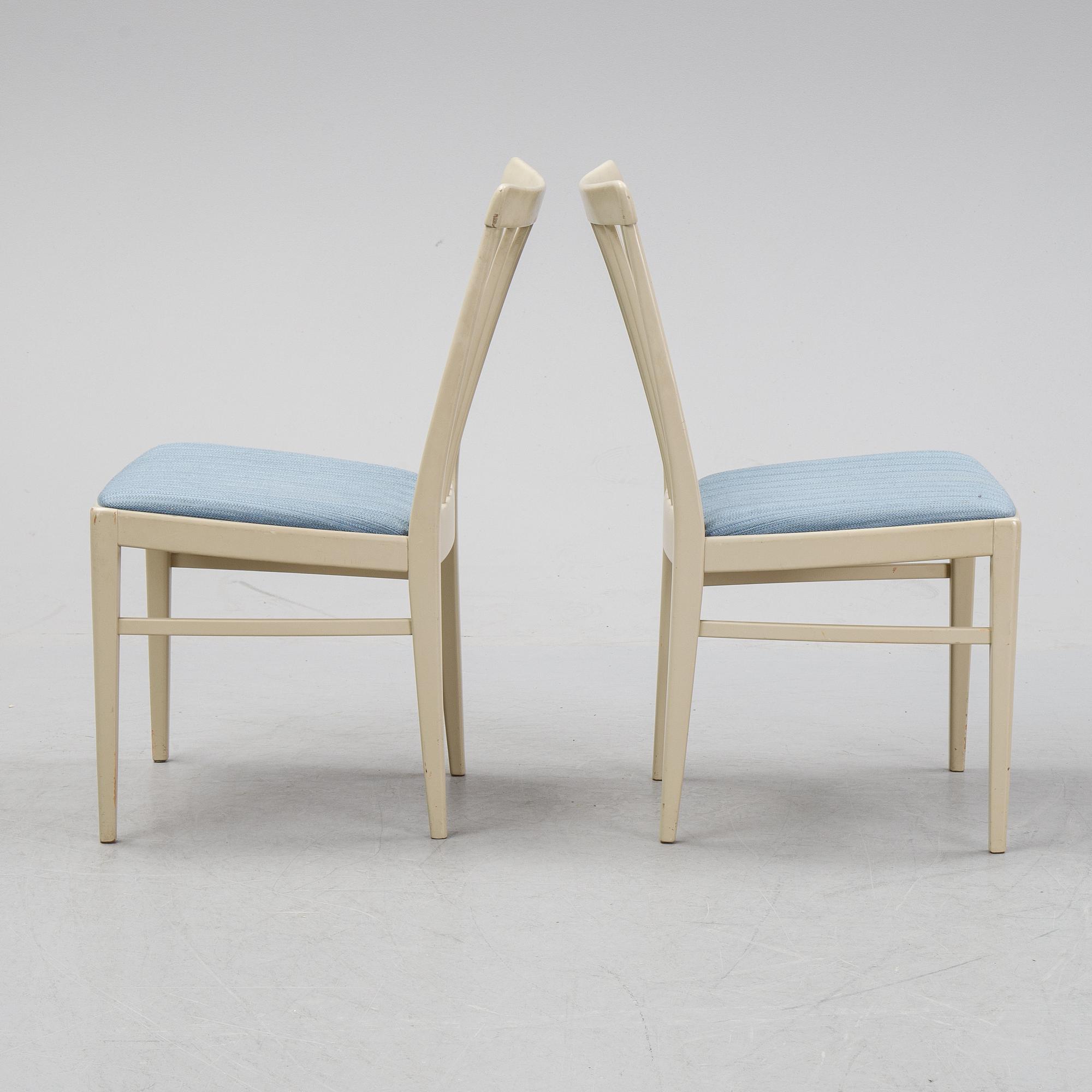 A dining table with six chairs by Carl Malmsten, second half of the 20th Century.