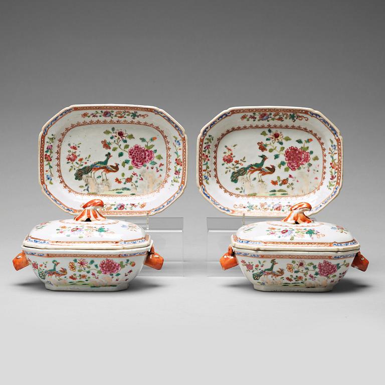 A pair of famille rose 'double peacock' butter tureens with covers and stands, Qing dynasty, Qianlong (1736-95).