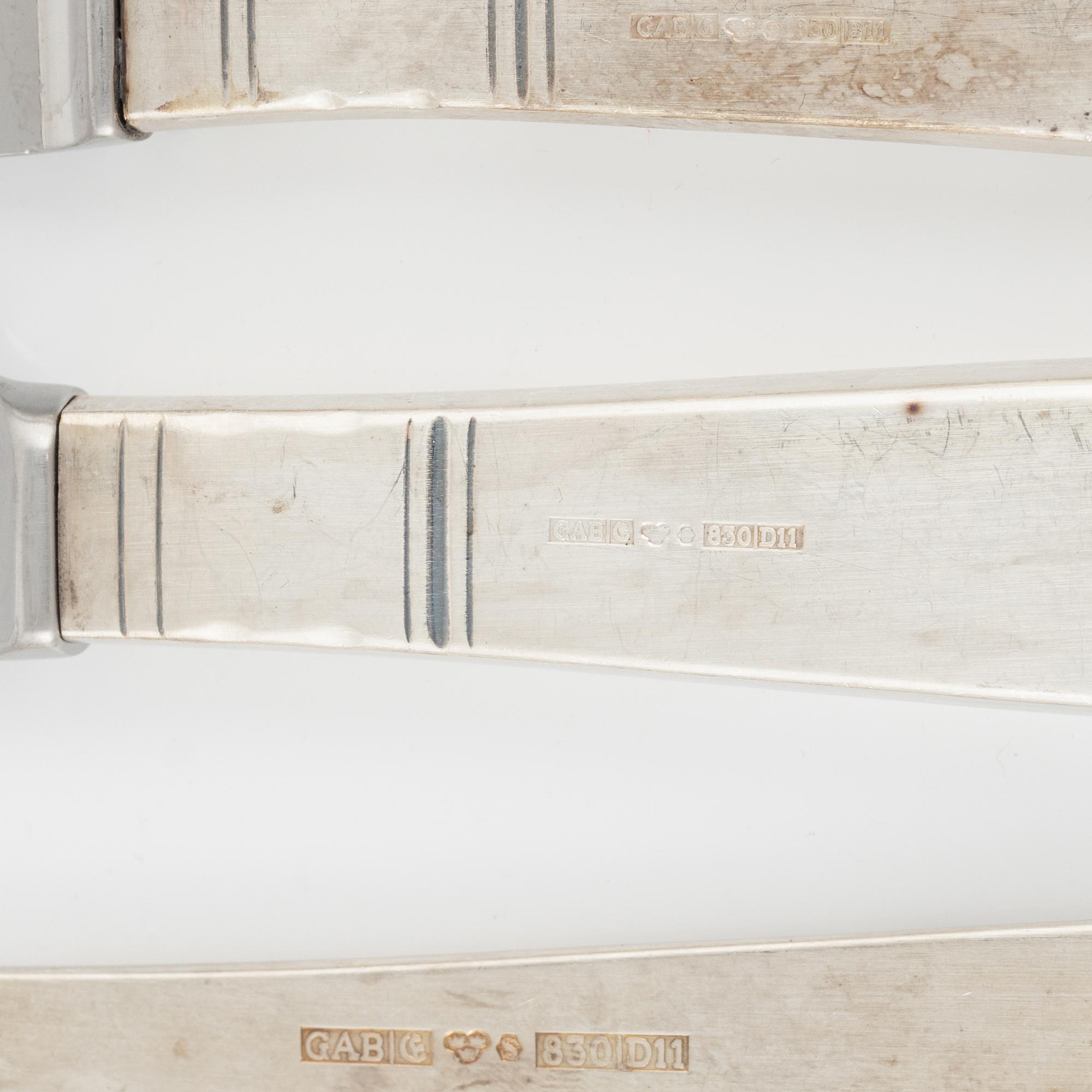 Bestick, brevkniv samt bägare, silver, bl a CG Hallberg Stockholm 1919 (24 delar).