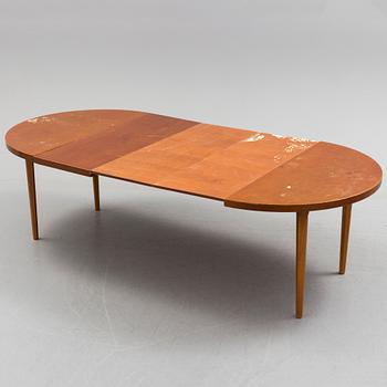 A 1940s mahogany veneer table.