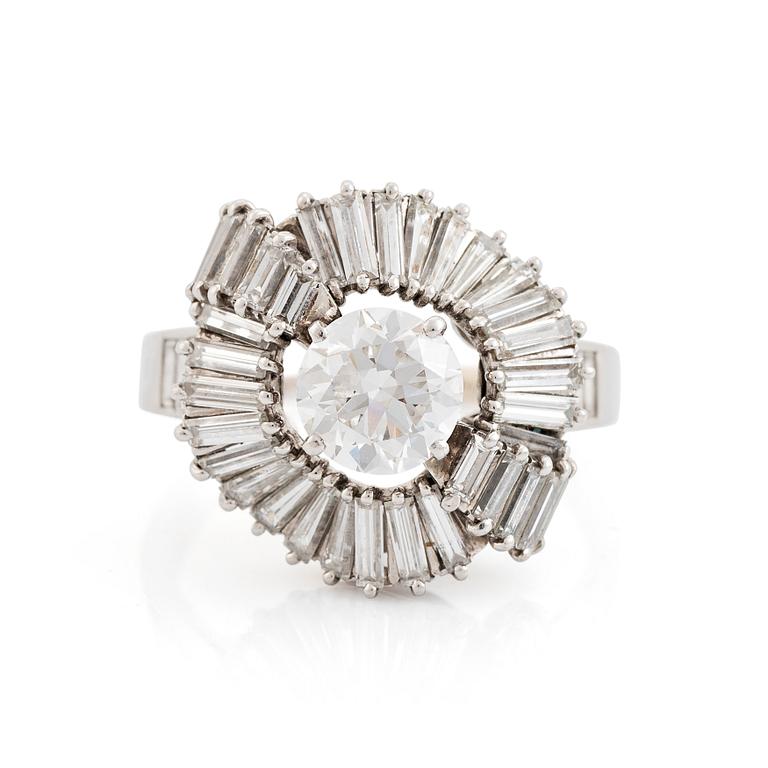 A Boucheron platinum ring set with a round brilliant-cut diamond weight ca 1.25 cts quality ca H vvs.