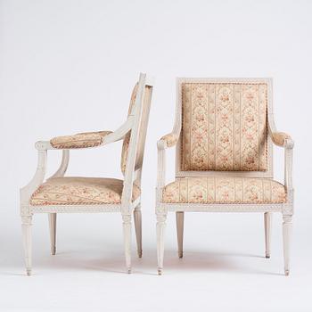 A pair of Gustavian open armchairs by J. Lindgren (master in Stockholm 1770-1800).