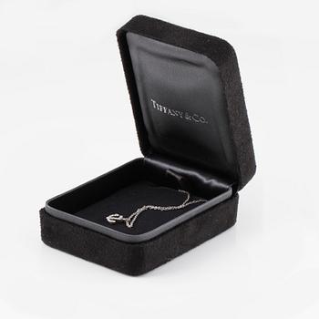 HÄNGE, Tiffany & Co, 18K vitguld med 16 briljantslipade diamanter. Vikt 2,2 gram.