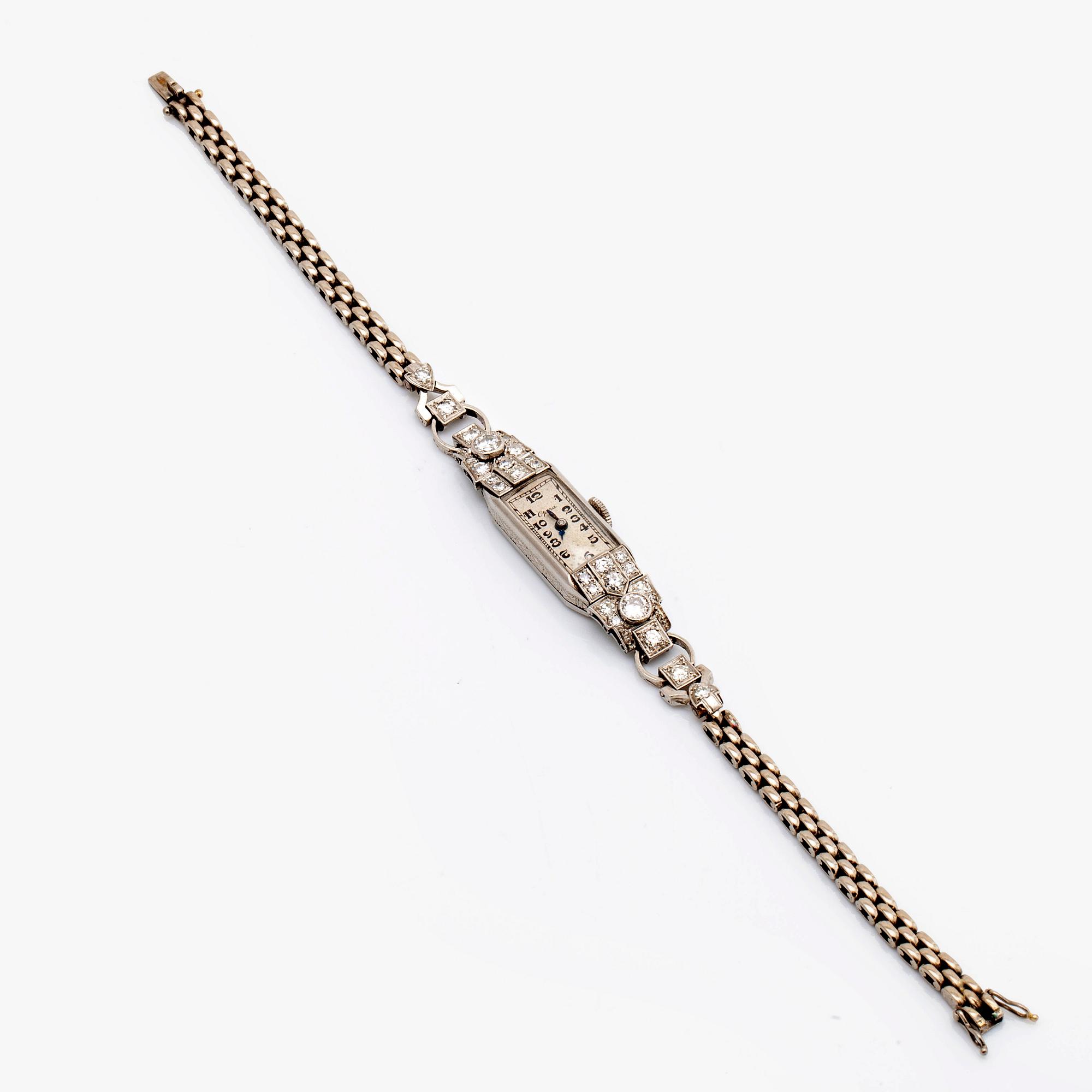 WRISTWATCH Opera, 18k whitegold, old-cut diamonds approx 1 ct, approx 15 x 8 mm, manual.