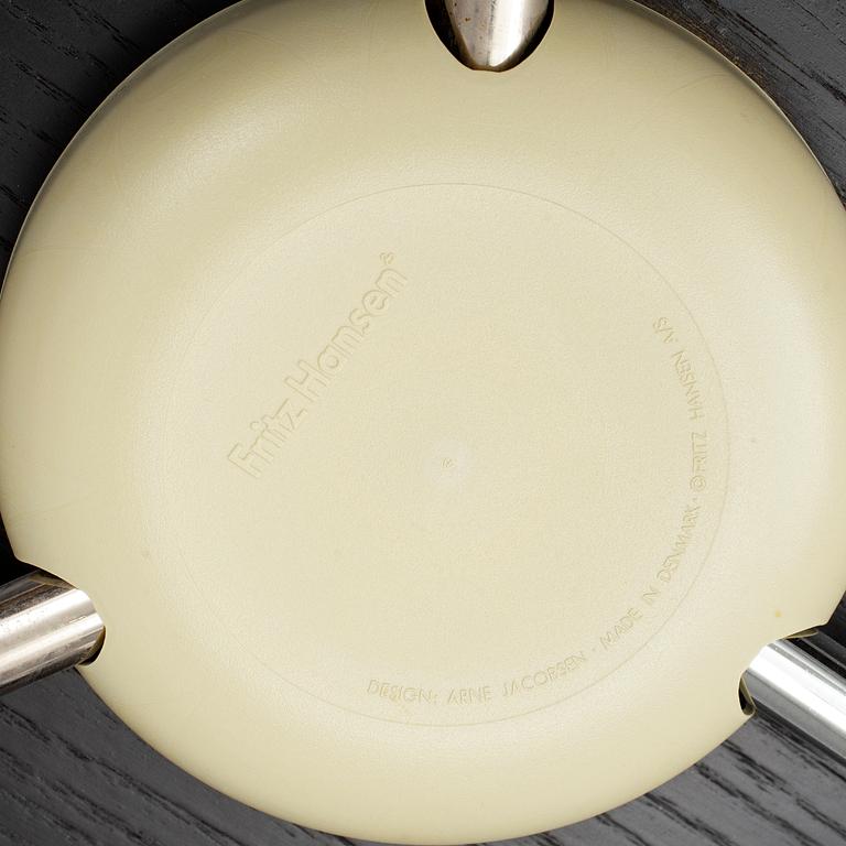 An Arne Jacobsen "Centenary Package" comprising three "Ant Chairs" and an eggshaped table, Fritz Hansen, Denmark.