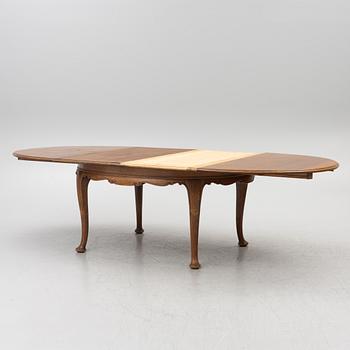 Dining table, 8 chairs, 2 armchairs, sideboard, Rococo style, early 20th century.