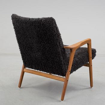 YNGVE EKSTRÖM, a 'Mingo' oak armchair, designed in 1956.