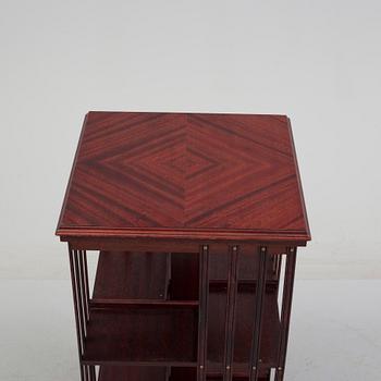 An second half of the 20th century turning book shelf veneered with mahogny.