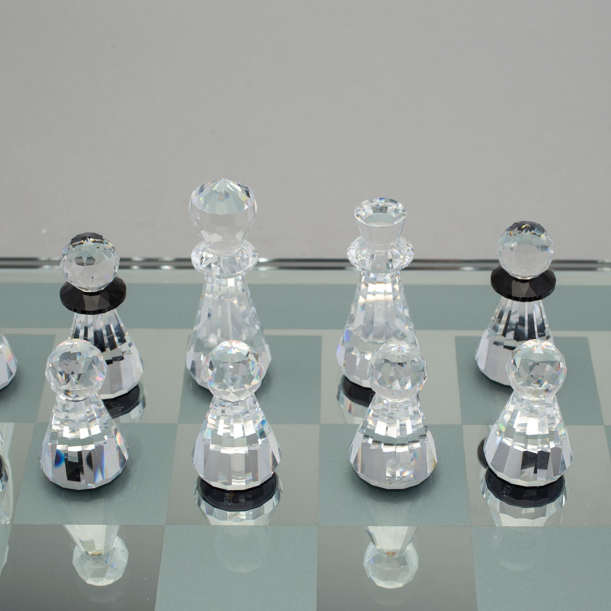 A SWAROVSKI CHESS SET.