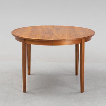A teak veneered dining table, 1960's.