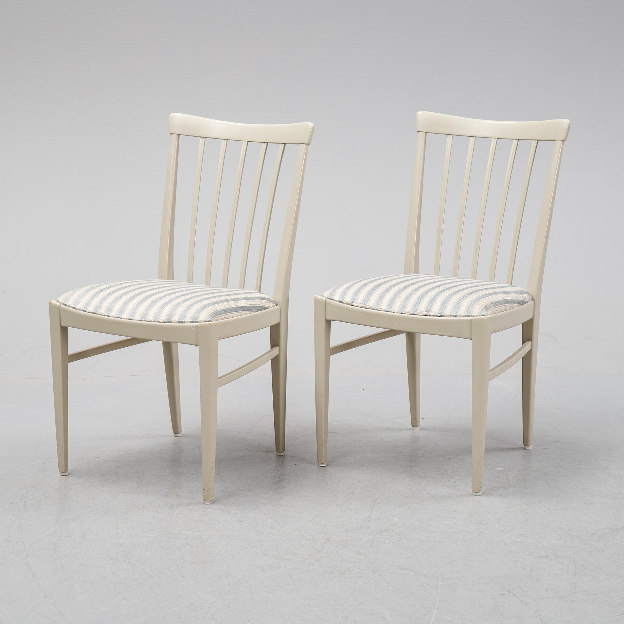 A dining table and six chairs by Carl Malmsten for Bodafors.